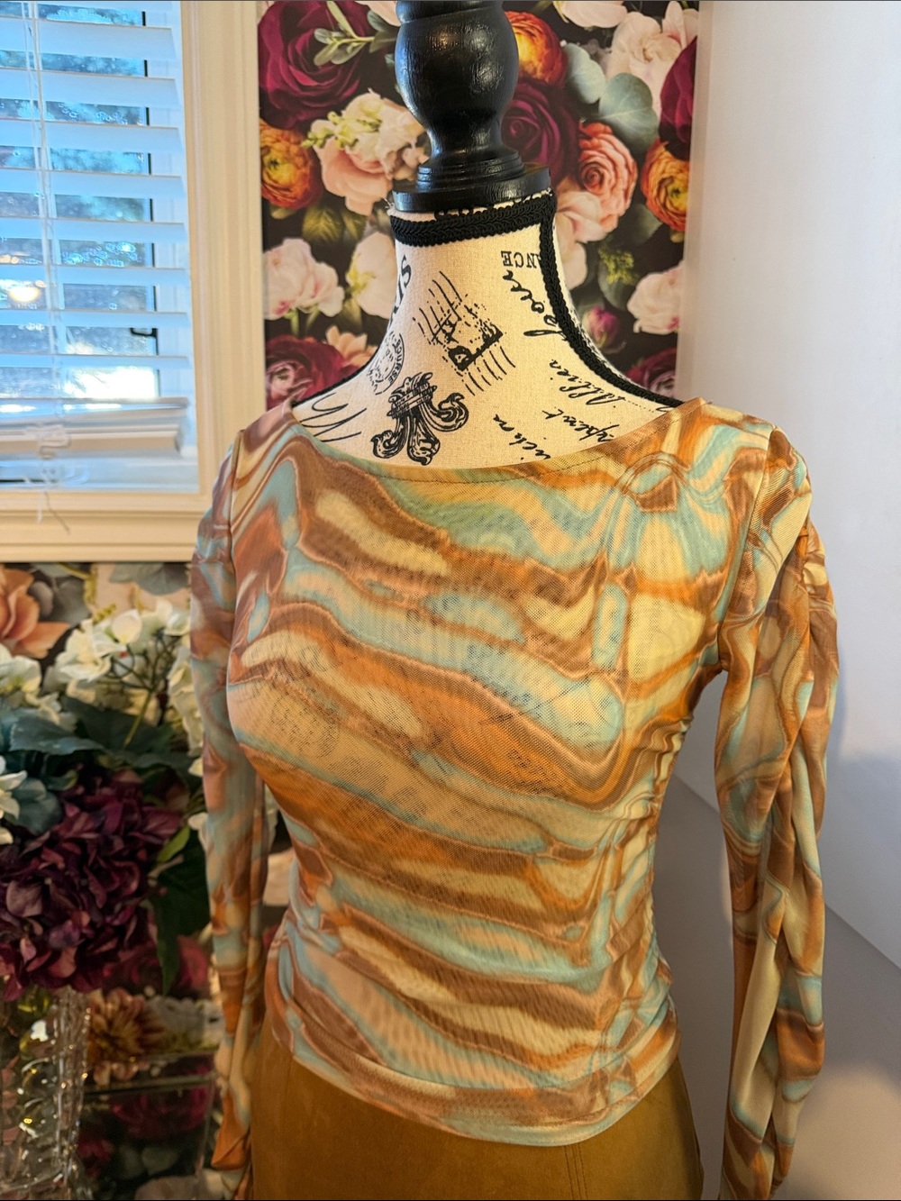 Dynamite Long-Sleeve Wave-Print Top in Aqua , tan, and brown hues